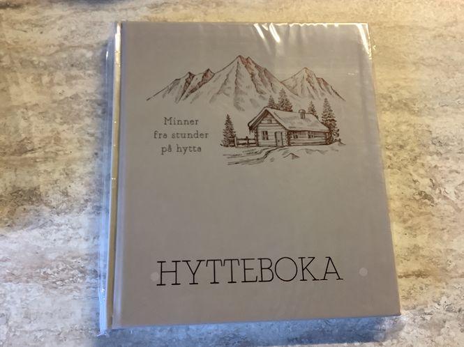Hovedbilde Hyttebok beige